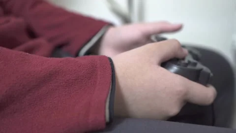 Man hand and console playing video games pressing button in living room at home Stock-Footage 334653753