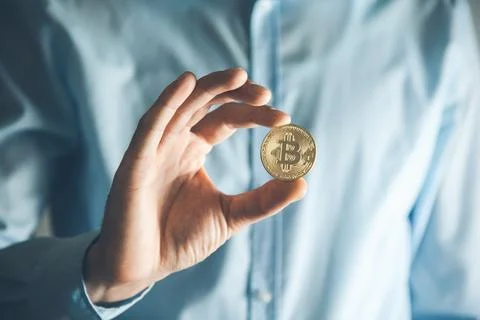 Man hand bitcoin Stock Photos