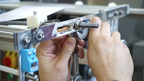 Man hand bolt is rotated. Assembles furniture. Close up. Video stock 137864470