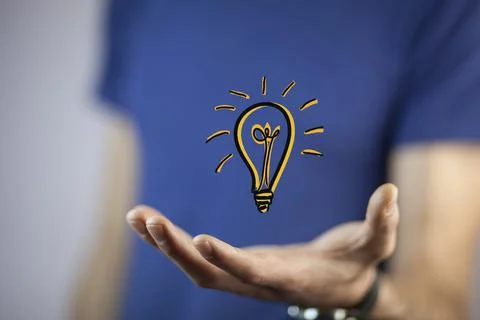Man hand bulb Stock Photos