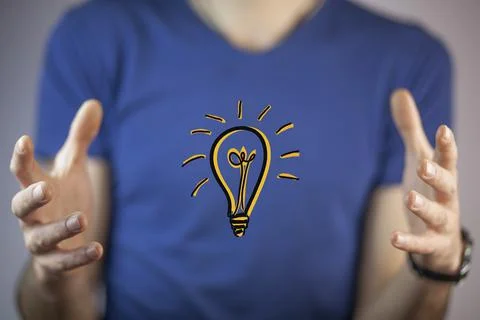 Man hand bulb Stock Photos