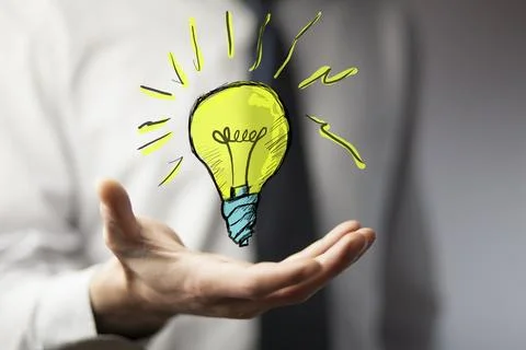 Man hand bulb in screen Stock Photos