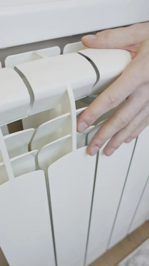 Man Hand Checking Temperature Of Home Central Heating Radiator Stock Footage 329608935