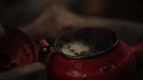 A man Hand checking the  typical Morrocan fresh mint tea Stock Footage 156581930