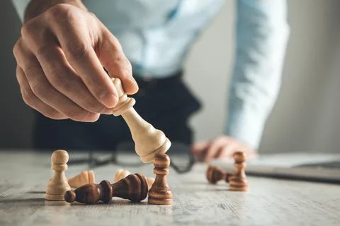 Man hand chess Stock Photos