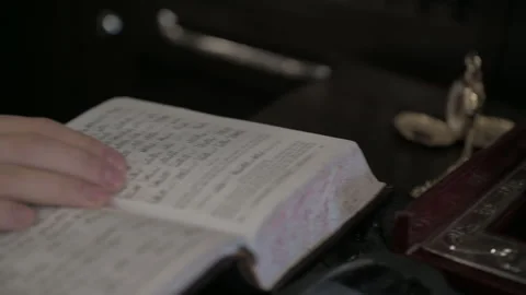 Man hand close up on a Book of Prayers Stock Footage 246247580