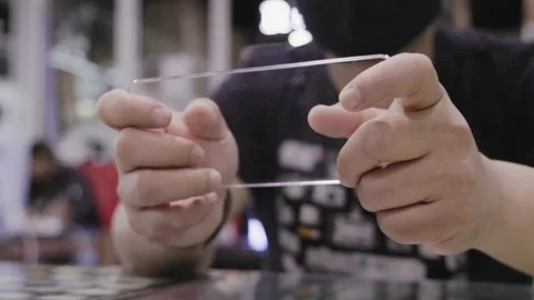 Man hand close-up playing smartphone screen futuristic. multimedia technology Stock Footage 152305091