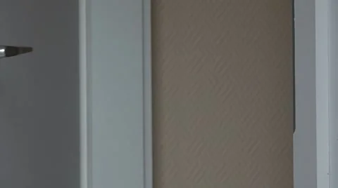 Man hand closing the white door with keys  Stock Footage 46213656