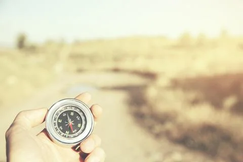 Man hand  compass Stock Photos