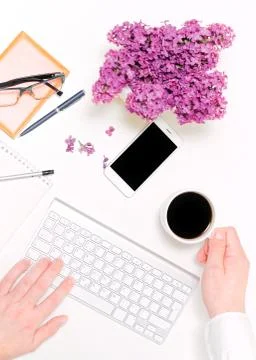 Man hand computer keyboard coffee mobile phone notebook lilac Stock Photos