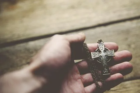 Man hand  cross Stock Photos