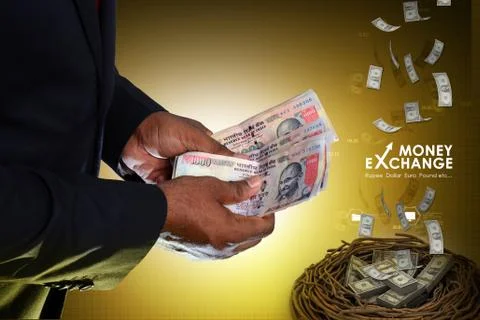 Man hand with currency notes Stock Photos