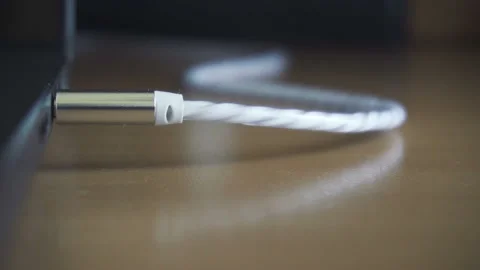 Man hand disconecting headphones cable, audio jack insert. Close up shot Stock Footage 87878343