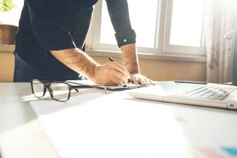 Man hand document with keyboard Stock Photos