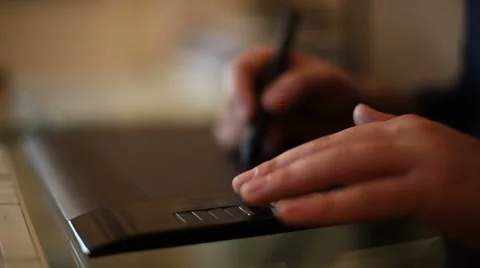 A man hand drawing on graphic tablet Stock Footage 46112042
