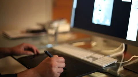 A man hand drawing on graphic tablet Stock Footage 46112560
