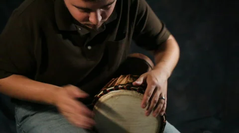 Man On Hand Drum Stock Footage 716184
