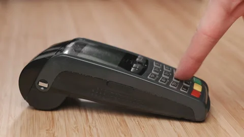Man hand enters pin code on the terminal for payment. Stock Footage 152996772