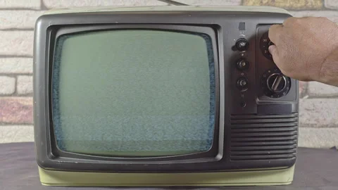 Man Hand Fine Tuning And Channel Search Vintage Television with Control Butt Stock Footage 306102203