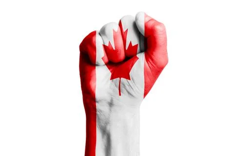 Man hand fist of CANADA flag painted. Close-up. Stock Photos