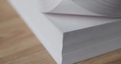 Man hand flips through stack of white blank sheets of paper 스톡 동영상 260890366