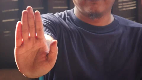 Man hand gesturing to stop Stock-Footage 334024163