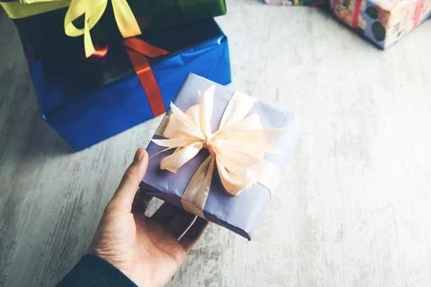 Man hand gift box Stock Photos
