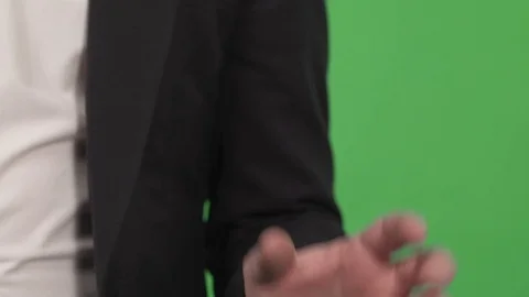 Man hand on green background Stock Footage 130144544