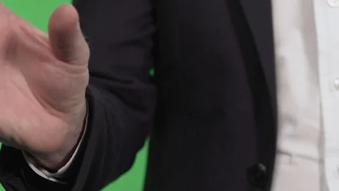 Man hand on green background Stock Footage 130144545