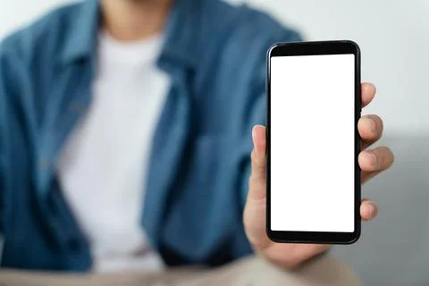 Man hand holding blank empty white screen smart phone. Stock Photos
