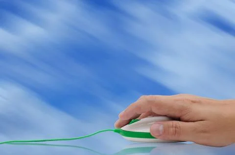 Man hand holding computer mouse with green cable. Business concept. Stock Photos