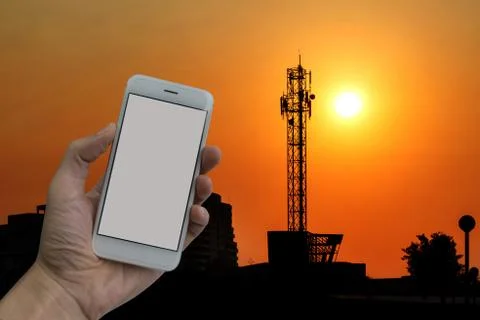 Man hand holding empty screen of smart phone and Large antenna Stock Photos