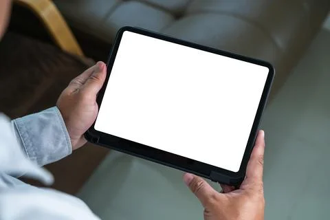 Man hand holding tablet touch white screen isolated screen ONLINE ADVERTISI.. Stock Photos