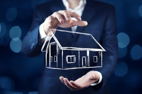 Man hand house model in screen Stock Photos