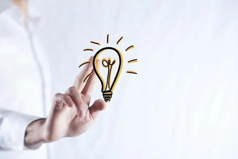 Man hand idea or light bulb in screen Stock Photos