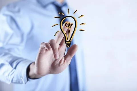 Man hand idea or light bulb in screen Stock Photos