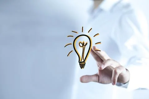 Man hand idea or light bulb in screen Stock Photos