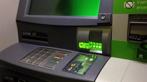 Man hand inserting a bank card to deposit a cheque Video stock 48786922