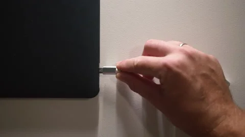 Man hand Inserting card reader Cable Into Laptop, Storage top view Shot Stock Footage 169669597