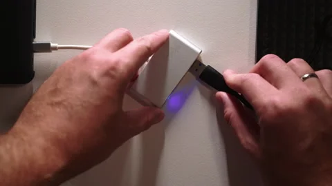 Man hand Inserting hdd Cable Into card reader, Storage top view Shot Stock Footage 169669585