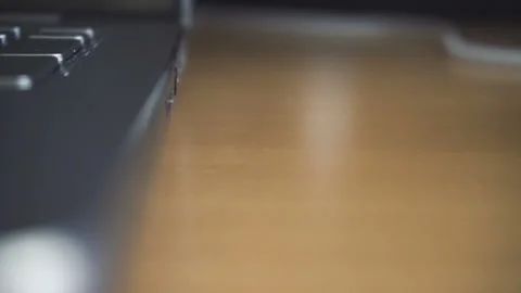 Man hand inserting headphones cable into audio jack insert. Close up shot Stock Footage 87878147