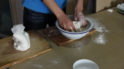 Man hand kneading dough to make steamed buns Stock Footage 47694696