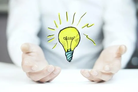Man hand light bulb Stock Photos