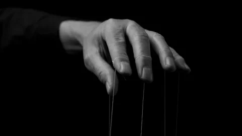 Man hand manipulating, controlling smth, moving fingers with strings. Master Stock Footage 201213806