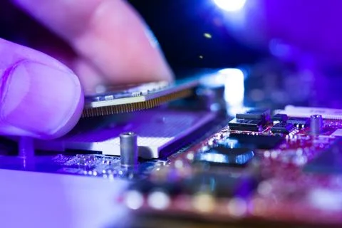 Man hand microchip Stock Photos