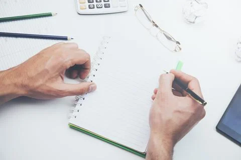 Man hand notepad working Stock Photos