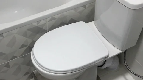 Man Hand Open And Close Toilet Lid, Close Up. Stock Footage 127982616