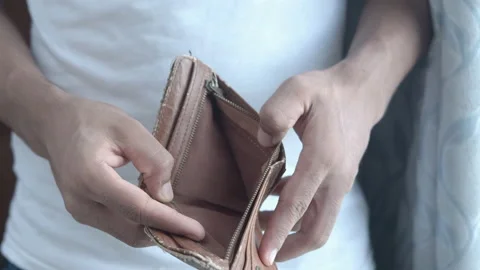 Man hand open an empty wallet with copy space. Stock Footage 156339059