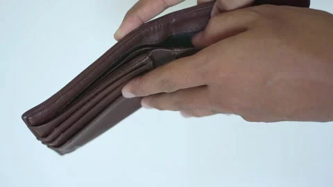 Man hand open an empty wallet on white background Stock Footage 322109736