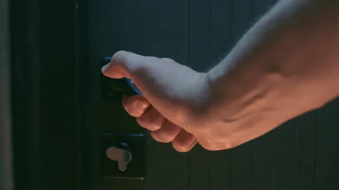 Man Hand Opening Modern Front Door from Inside | Close-Up Grabbing Door Handle Stock Footage 345764864